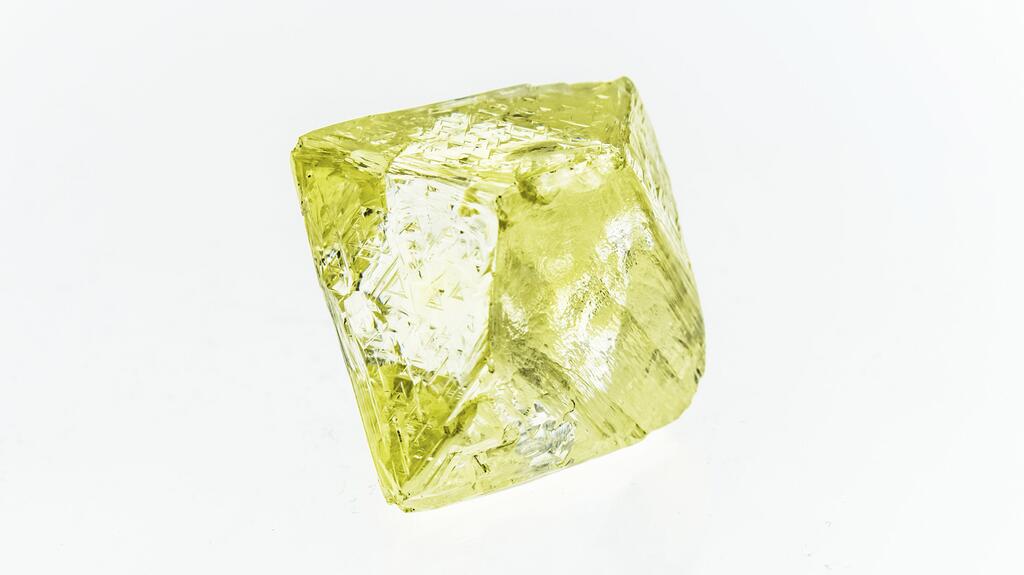 Mountain Province Diamonds announced the recovery of this 151.6-carat rough yellow diamond from the Gahcho Kué mine on Aug. 31. It operates Gahcho Kué in partnership with De Beers Canada. (Photo courtesy of Mountain Province Diamonds Inc.) 20221004_Mountain Province yellow.jpg